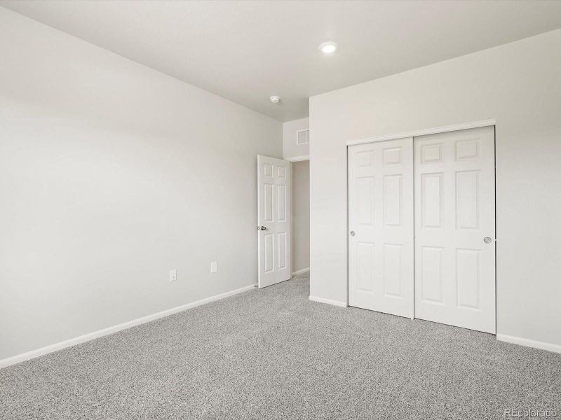 Spacious, unfurnished interior of a new home in Poudre Heights: The Alpine Collection, Windsor (Image 26).