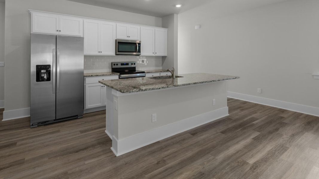 Representative furnished interior of a home built from the WREN by D.R. Horton in Indigo Preserve, Leland (Image 9). Representative furnished interior of a home built from the WREN by D.R. Horton in Indigo Preserve, Leland (Image 9).