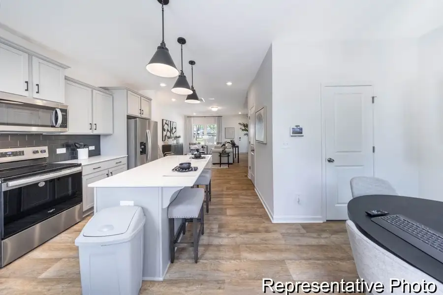 Furnished interior view inside a new home in Hoover Townhomes, Charlotte (Image 7).