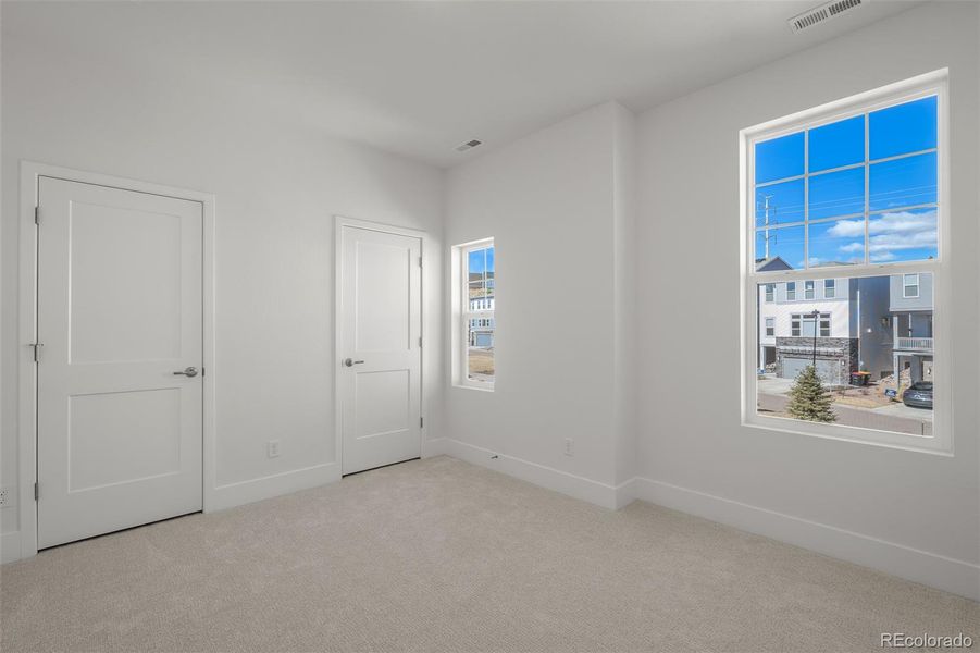 Spacious, unfurnished interior of a new home in Trailside at Cottonwood Creek, Colorado Springs (Image 32).