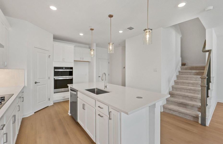 Furnished interior view inside a new home in Monarch on Main, Round Rock (Image 7).