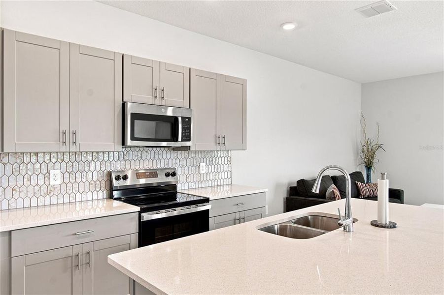 Furnished interior view inside a new home in , Kissimmee (Image 16).