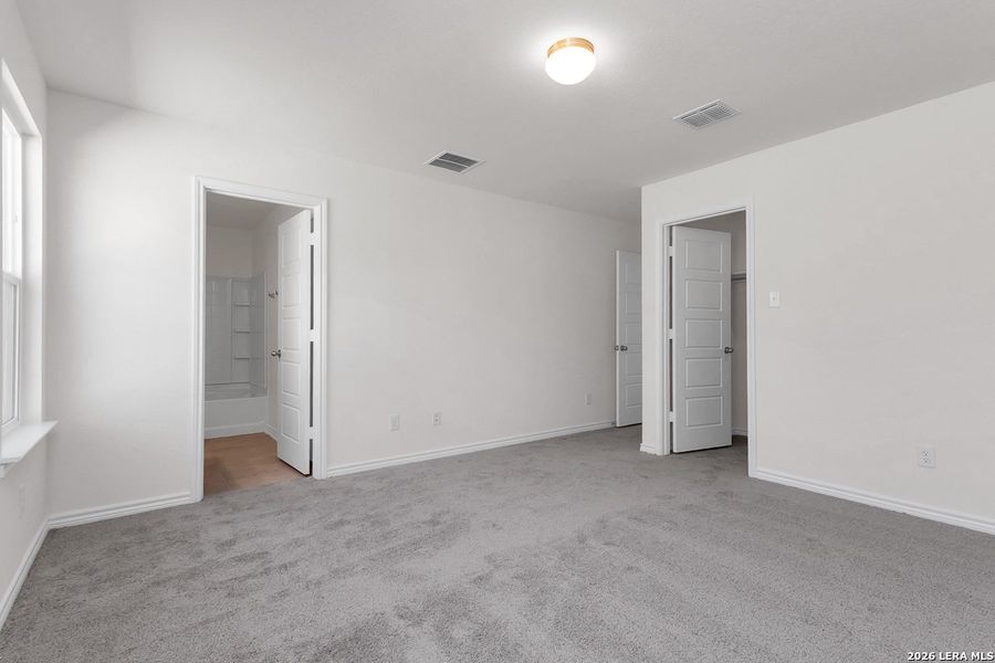 Spacious, unfurnished interior of a new home in Hidden Bluffs at TRP, San Antonio (Image 7).