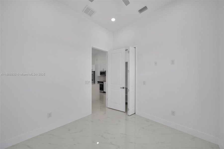 Spacious, unfurnished interior of a new home in , Cape Coral (Image 29).