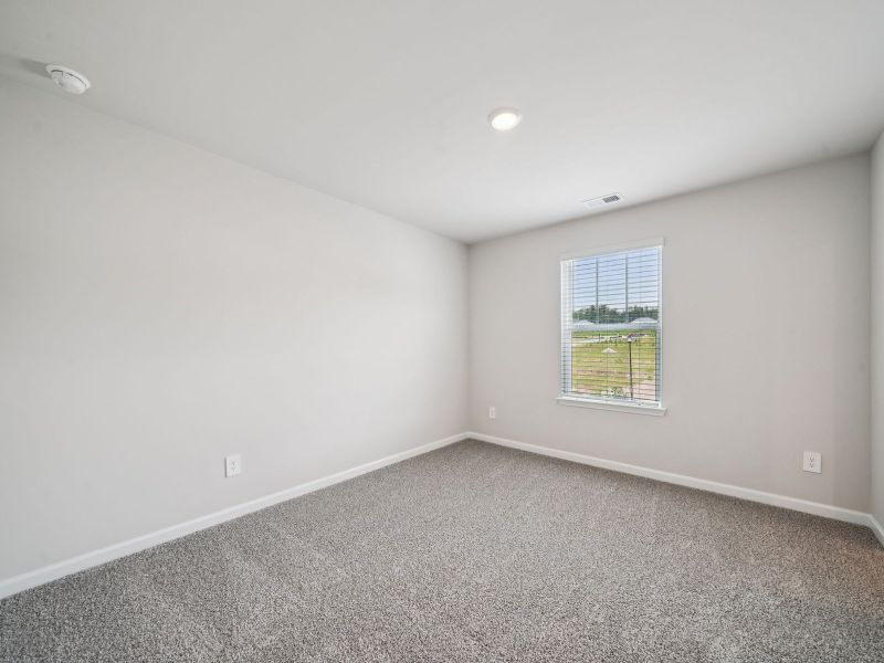 Spacious, unfurnished interior of a new home in Vines at Mill Creek - Estate Series, Braselton (Image 17).