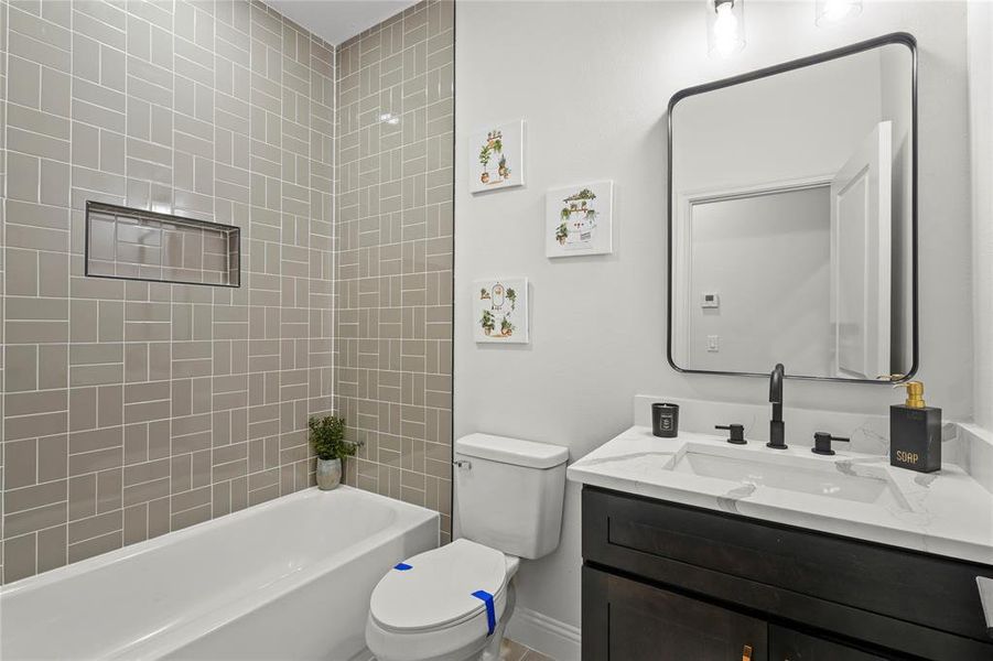 Full bathroom featuring shower / washtub combination and vanity