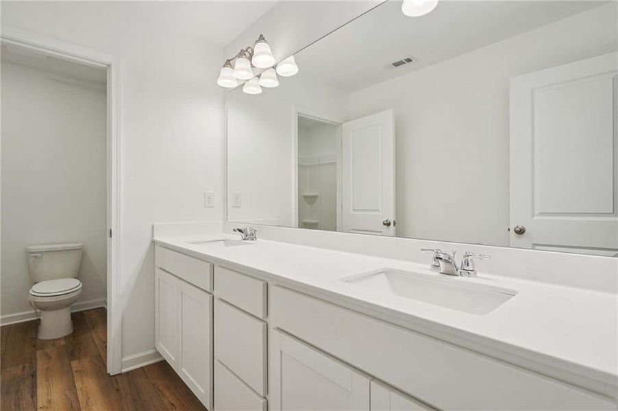 Furnished interior view inside a new home in The Pointe at Heron Bay, Locust Grove (Image 11).