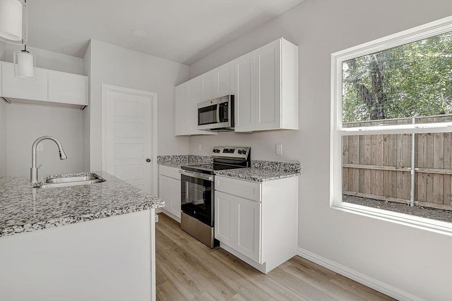 Furnished interior view inside a new home in , Fort Worth (Image 6).