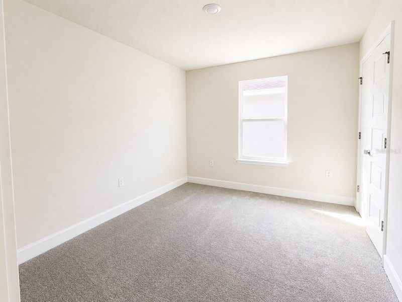 Spacious, unfurnished interior of a new home in Harmony Central, Harmony (Image 11).