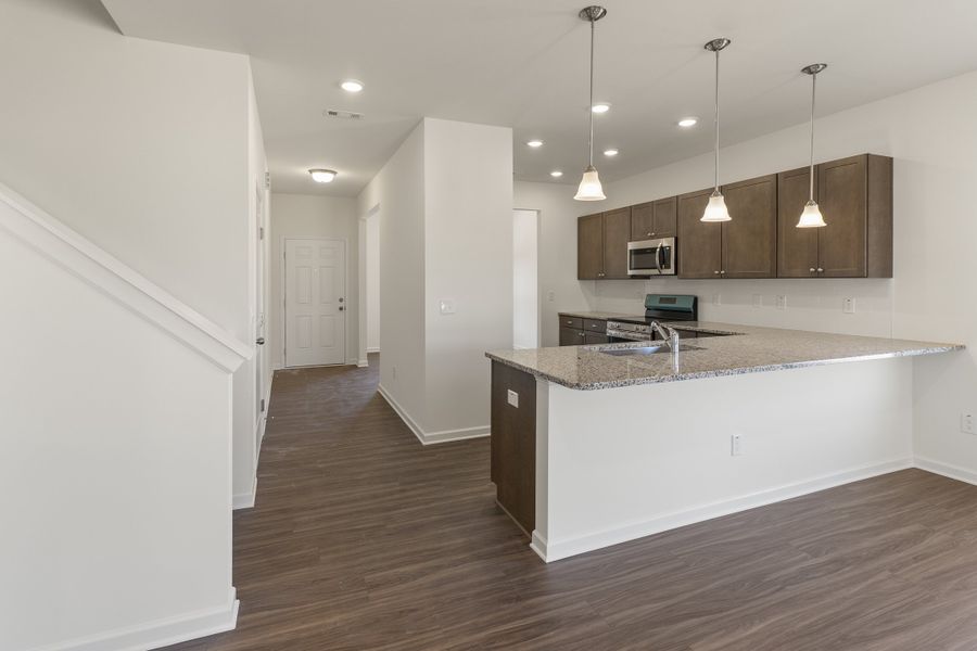Furnished interior view inside a new home in The Exchange, Vass (Image 5).