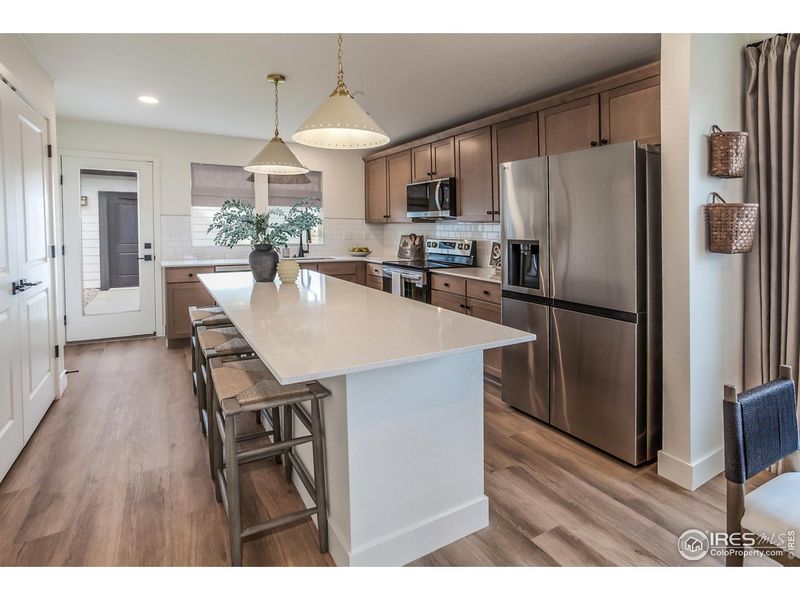 Furnished interior view inside a new home in Prairie Song Story Collection - Single Family Homes, Windsor (Image 7).
