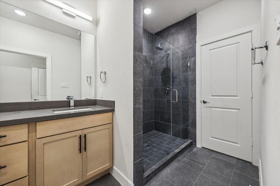 Primary Bathroom – Previous work by the builder in the community, not representation of exact unit listed.