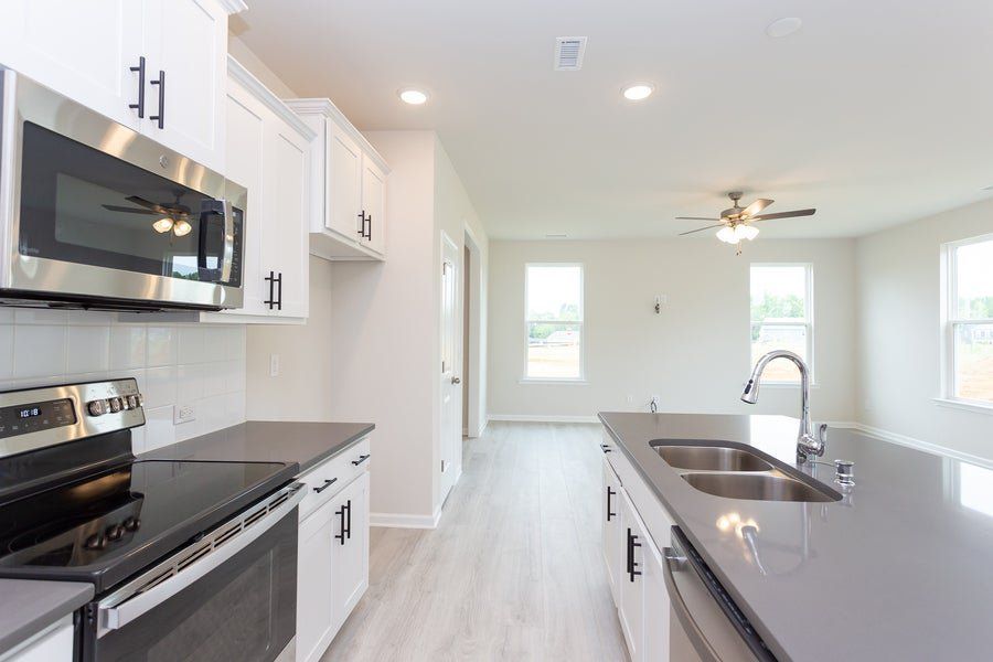Representative furnished interior of a home built from the The Sycamore by Chesapeake Homes in Traditions at Carolina Forest, Myrtle Beach (Image 9).