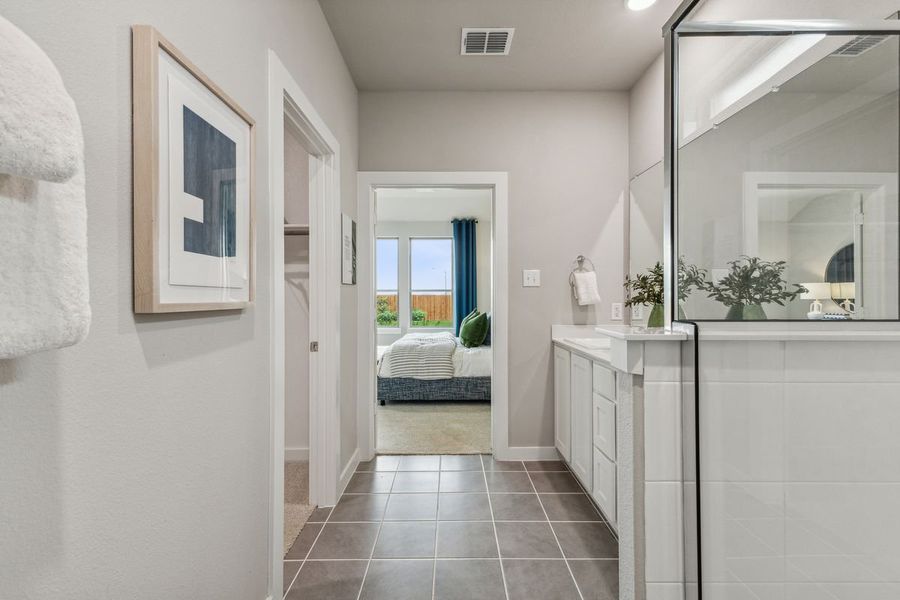 Primary Bathroom in the Stanley II home plan by Trophy Signature Homes – REPRESENTATIVE PHOTO