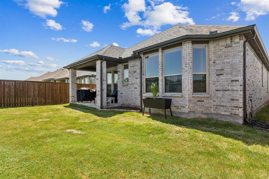 Front exterior of a new home in , Aubrey, TX, highlighting curb appeal (Image 22). Front exterior of a new home in , Aubrey, TX, highlighting curb appeal (Image 22).