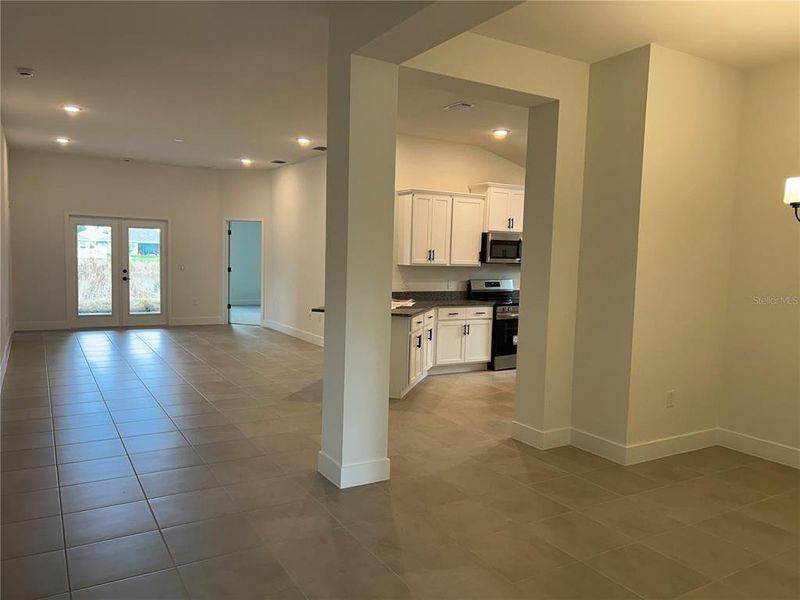Spacious, unfurnished interior of a new home in Watercress Cove, North Port (Image 10).