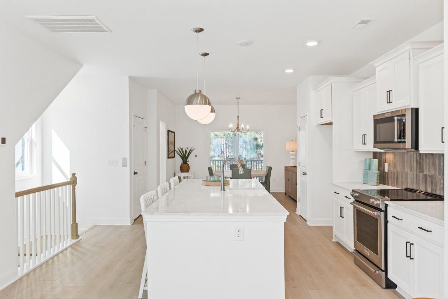 Representative furnished interior of a home built from the Tilley by McKee Homes in Anchors Bend Townes, Wilmington (Image 5).