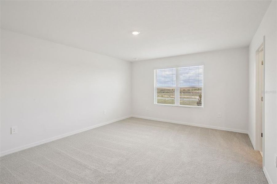 Spacious, unfurnished interior of a new home in Springs at Lake Alfred - Classic Series, Lake Alfred (Image 37).