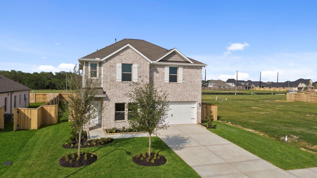 Front exterior of a new home in Arabella on the Prairie, Richmond, TX, highlighting curb appeal (Image 17).