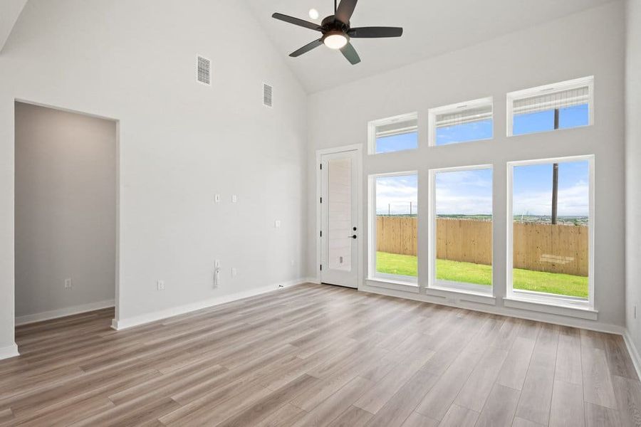 Spacious, unfurnished interior of a new home in Terrace Collection At Turner's Crossing, Buda (Image 34).