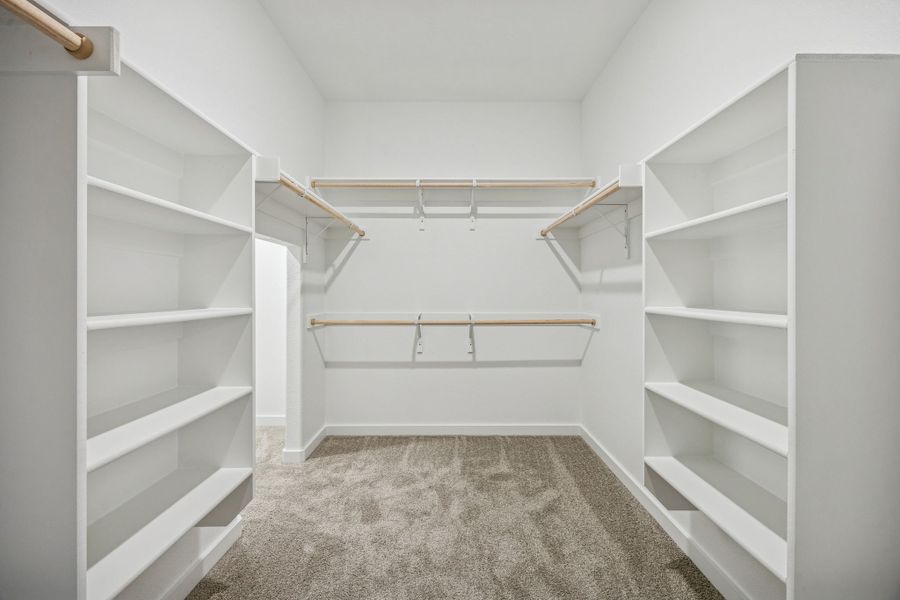 Primary Closet in the Wimbledon home plan by Trophy Signature Homes – REPRESENTATIVE PHOTO
