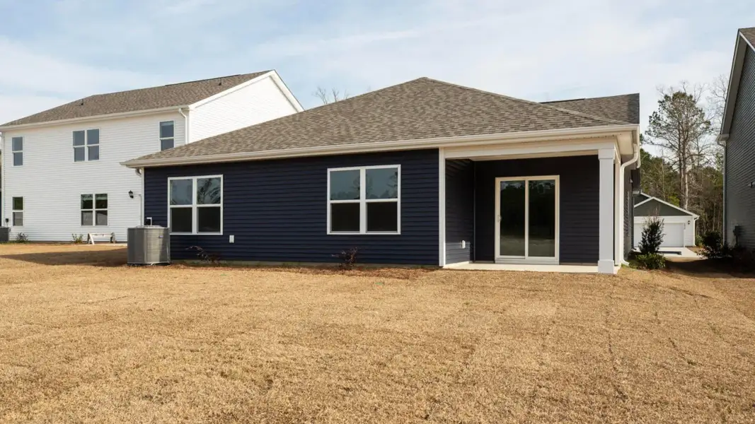 Exterior details and patio area of a home in Vineyard Trail, Jacksonville (Image 3).