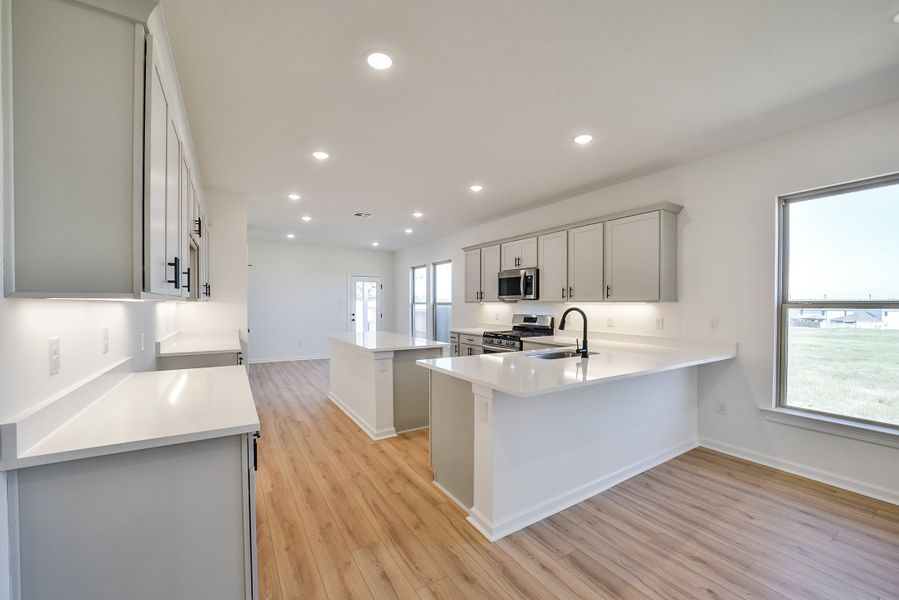 Furnished interior view inside a new home in Mostyn Springs, Magnolia (Image 8). Furnished interior view inside a new home in Mostyn Springs, Magnolia (Image 8).