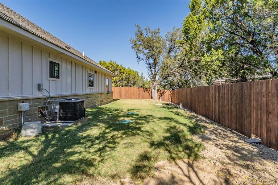 View of fenced backyard