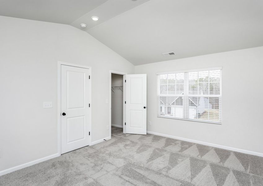 The master bedroom is filled with natural lighting. The master bedroom is filled with natural lighting.
