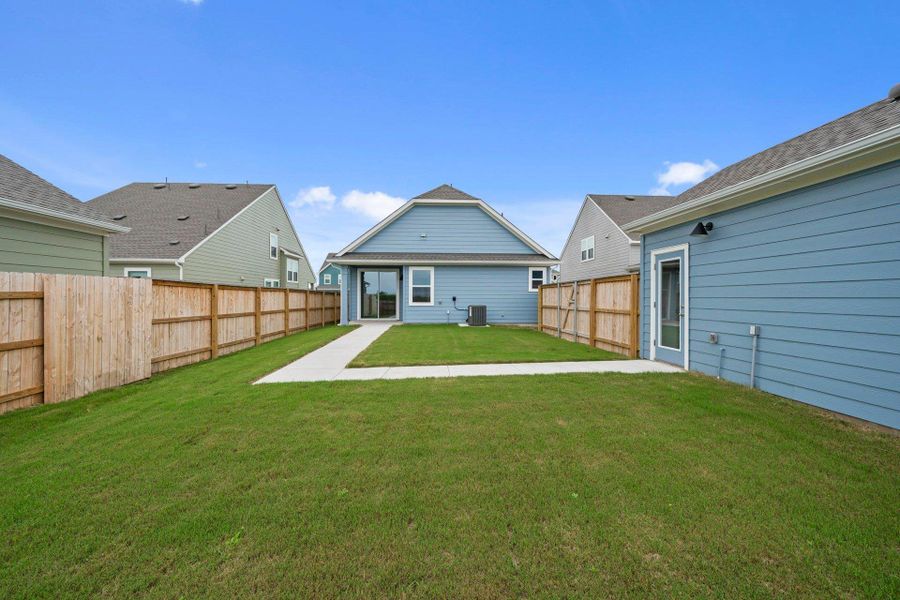 Rear of Home and Private Backyard