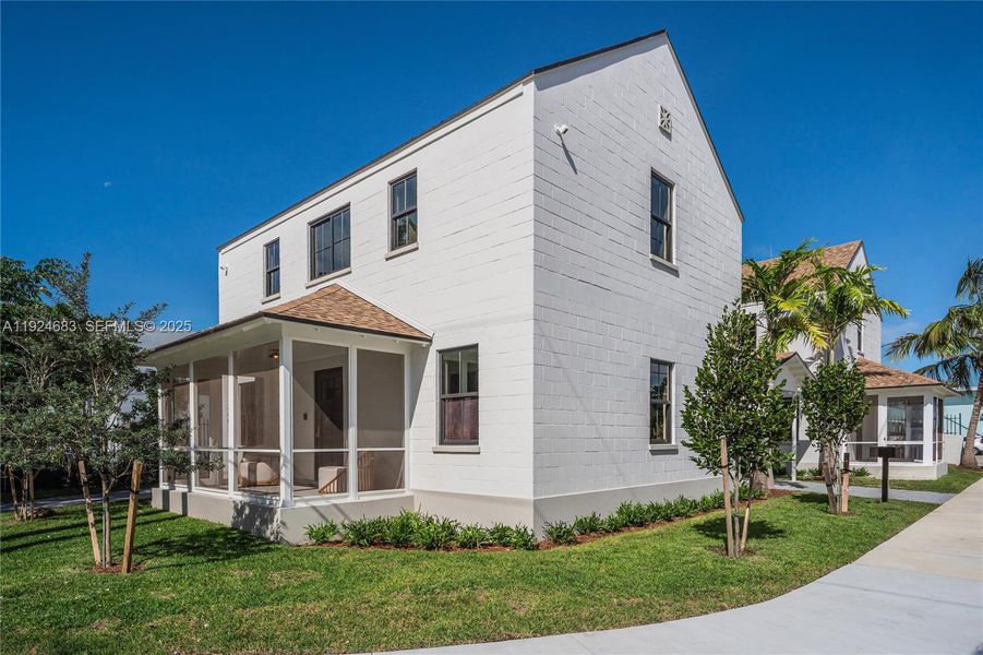 Front exterior of a new home in , Miami, FL, highlighting curb appeal (Image 1). Front exterior of a new home in , Miami, FL, highlighting curb appeal (Image 1).
