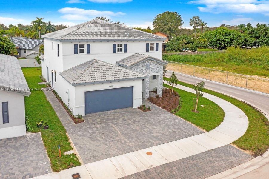 Front exterior of a new home in , Miami, FL, highlighting curb appeal (Image 23). Front exterior of a new home in , Miami, FL, highlighting curb appeal (Image 23).