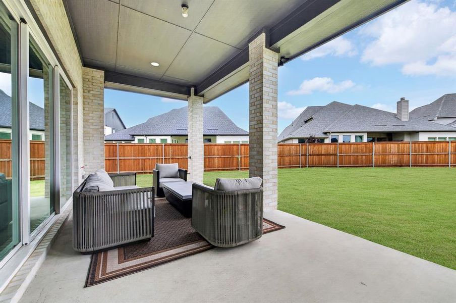 Exterior details and patio area of a home in Light Farms Graham/Reagan, Celina (Image 26).