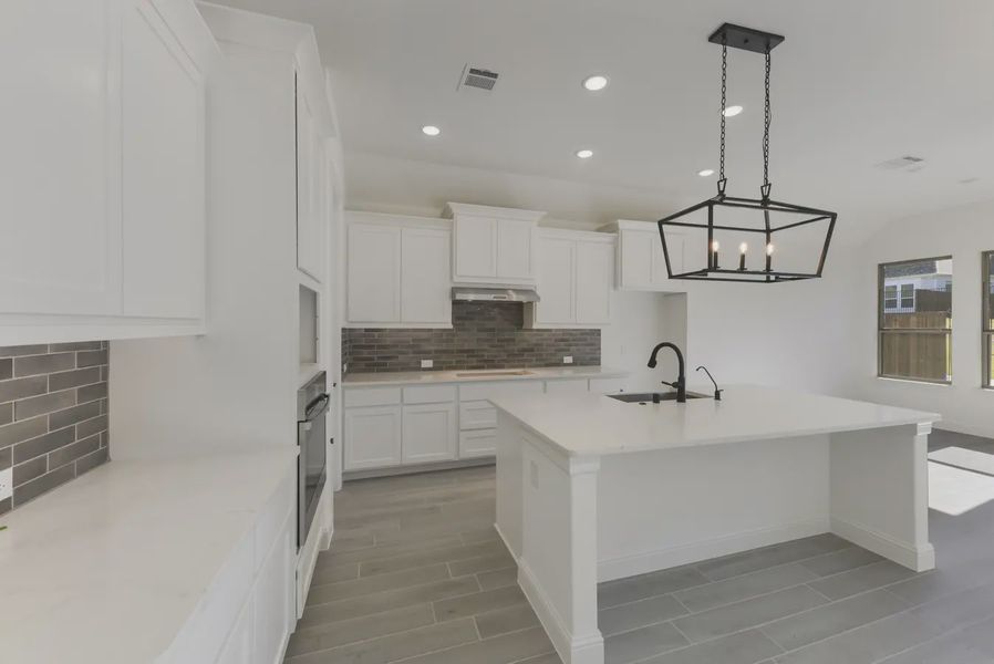 Representative furnished interior of a home built from the Everton by Chesmar Homes in Canyon Falls, Argyle (Image 5).