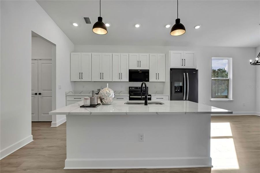 Furnished interior view inside a new home in , Weeki Wachee (Image 8).