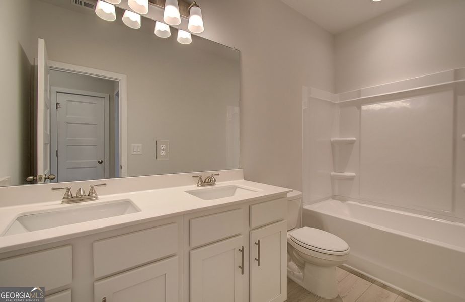 Furnished interior view inside a new home in Ponderosa Farms Estates, Gainesville (Image 4). Furnished interior view inside a new home in Ponderosa Farms Estates, Gainesville (Image 4).