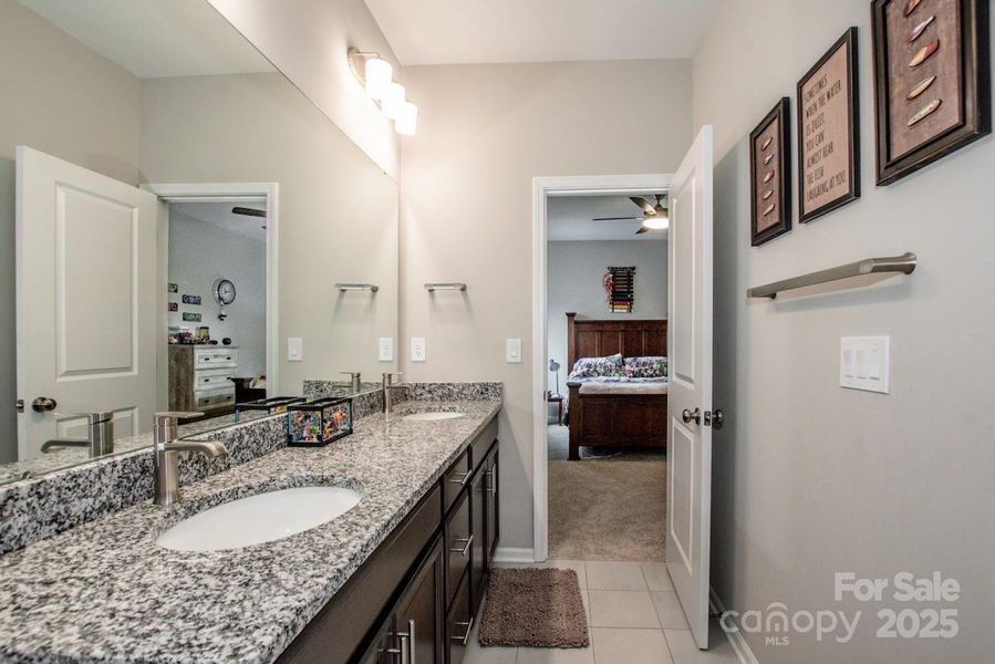 Furnished interior view inside a new home in Signature at Reid's Cove, Mooresville (Image 24).