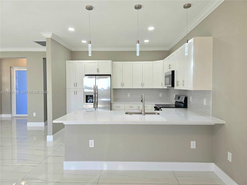 Furnished interior view inside a new home in , Lehigh Acres (Image 7).