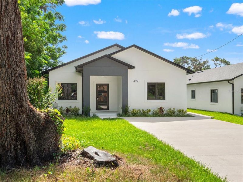 Front exterior of a new home in , Apopka, FL, highlighting curb appeal (Image 22). Front exterior of a new home in , Apopka, FL, highlighting curb appeal (Image 22).