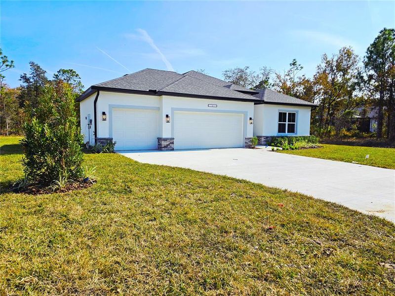 Front exterior of a new home in , Homosassa, FL, highlighting curb appeal (Image 29).