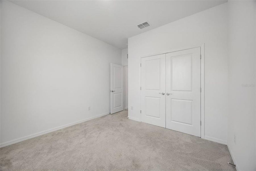 Spacious, unfurnished interior of a new home in Woodcreek, Wesley Chapel (Image 27).