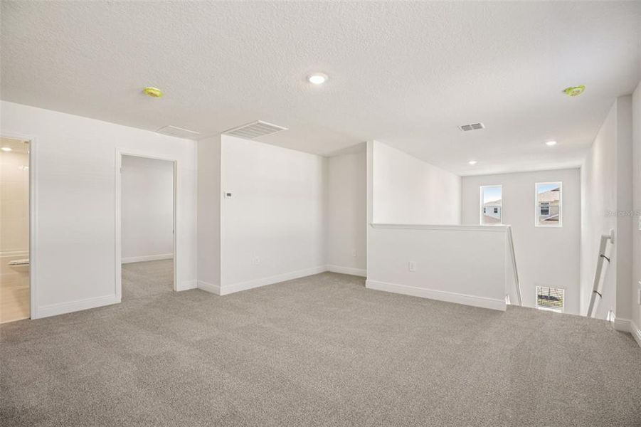 Spacious, unfurnished interior of a new home in The Reserve at Hammock Oaks - Classic Series, Lady Lake (Image 36).