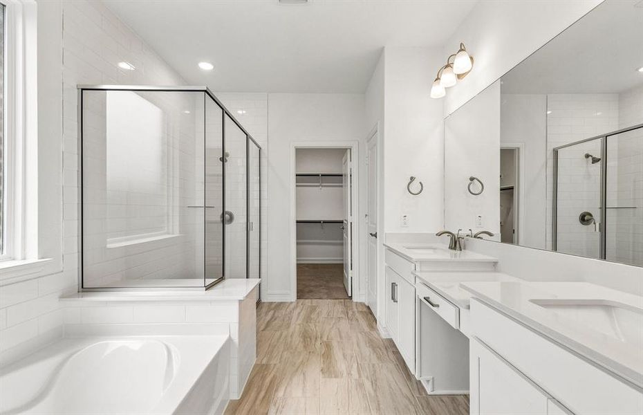 Primary bath with separate tub and shower Primary bath with separate tub and shower