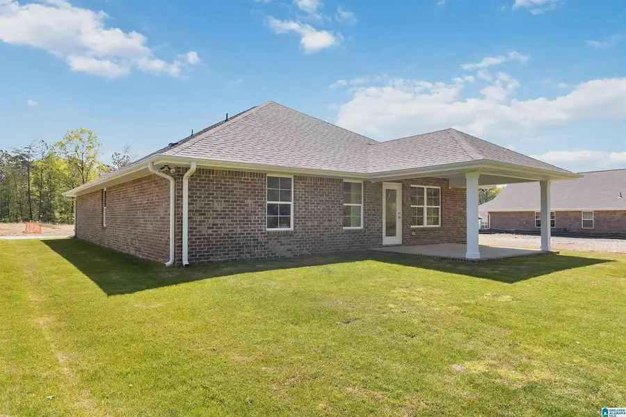 Representative exterior details of a home built from the 1635-C by Adams Homes in Kirkland Farms, Alachua (Image 4).