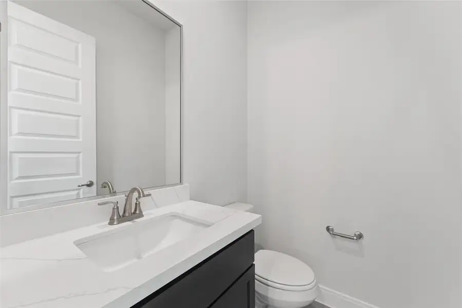 Furnished interior view inside a new home in The Corner At Buffalo Pointe, Houston (Image 10). Furnished interior view inside a new home in The Corner At Buffalo Pointe, Houston (Image 10).