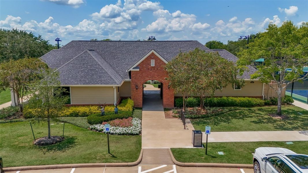 Front exterior of a new home in Sienna 40', Missouri City, TX, highlighting curb appeal (Image 1). Front exterior of a new home in Sienna 40', Missouri City, TX, highlighting curb appeal (Image 1).