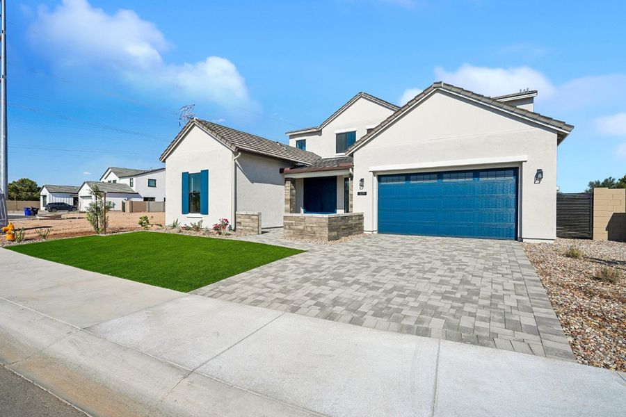 Front exterior of a new home in 33 North, Gilbert, AZ, highlighting curb appeal (Image 20). Front exterior of a new home in 33 North, Gilbert, AZ, highlighting curb appeal (Image 20).