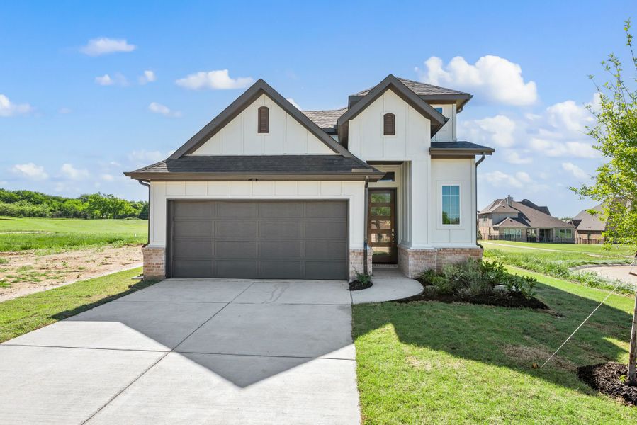 Representative exterior photo of a completed home built from the Emerald by Our Country Homes in The Resort on Eagle Mt. Lake, Saginaw, TX (Image 5).