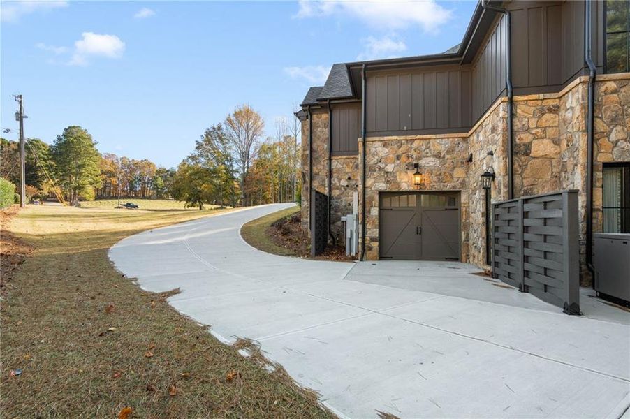 Front exterior of a new home in , Flowery Branch, GA, highlighting curb appeal (Image 30).