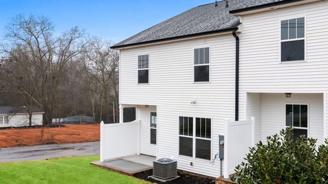 Exterior details and patio area of a home in Pearson Road Townhomes, Easley (Image 19). Exterior details and patio area of a home in Pearson Road Townhomes, Easley (Image 19).